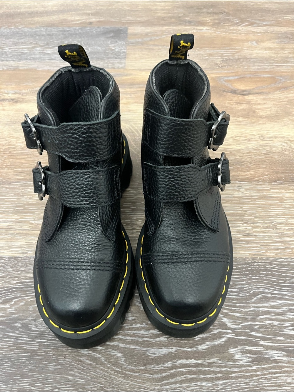 Dr. Martens Black Leather Combat Boots with Yellow Stitching